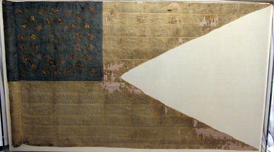 A faded American flag artifact inside of Fort Sill National Historic Landmark & Museum.